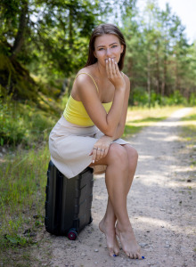 Amazing traveler Nana in yellow top and white skirt undresses on the road